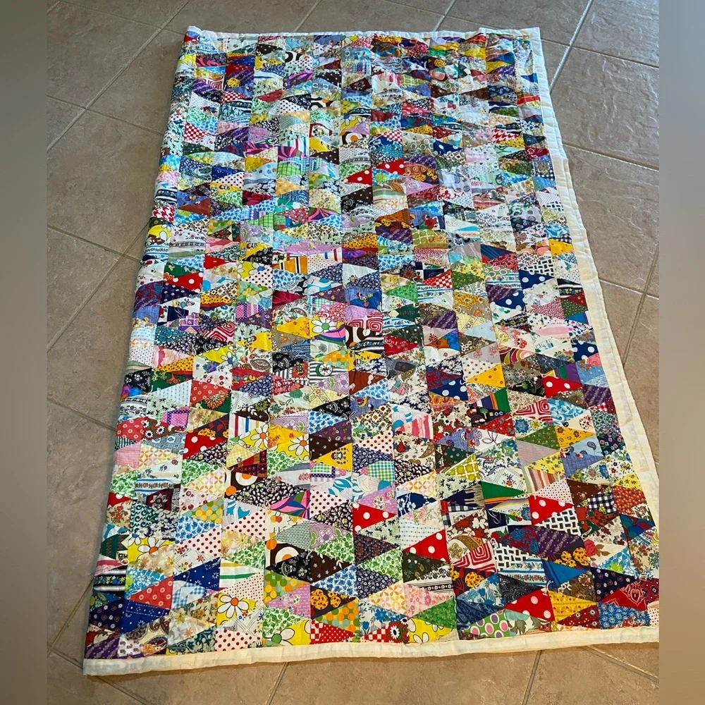 Vintage hand made quilt triangular fabric with solid reverse side